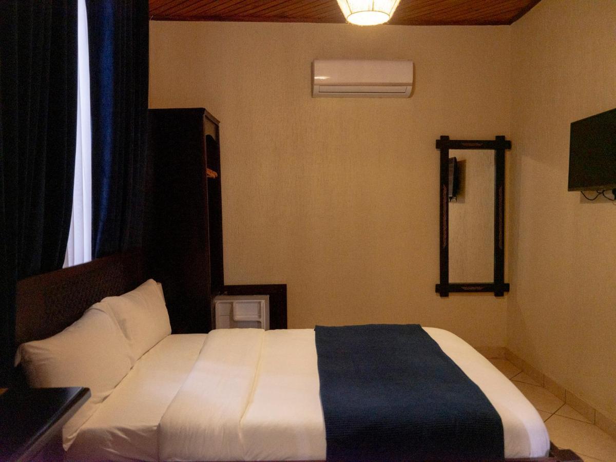 The Haven Boutique Hotel Кумаси Екстериор снимка