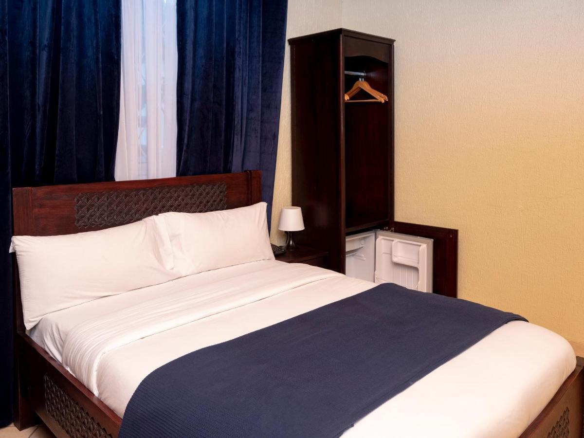 The Haven Boutique Hotel Кумаси Екстериор снимка